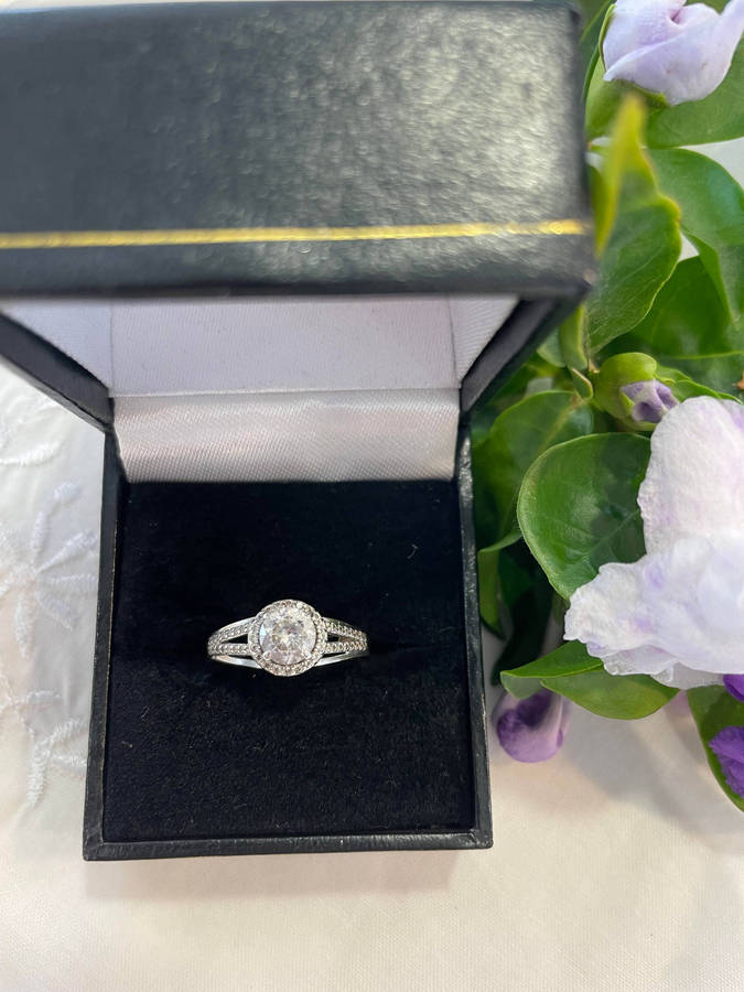 Bright Sterling Silver 925 stamped Engagement, promise ring with CZ surrounded by smaller CZ!