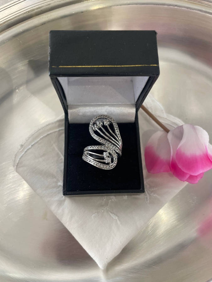 Unique Design 925 Sterling Silver "Stars Bypass" cocktail ring. Adorn with small clear stones!