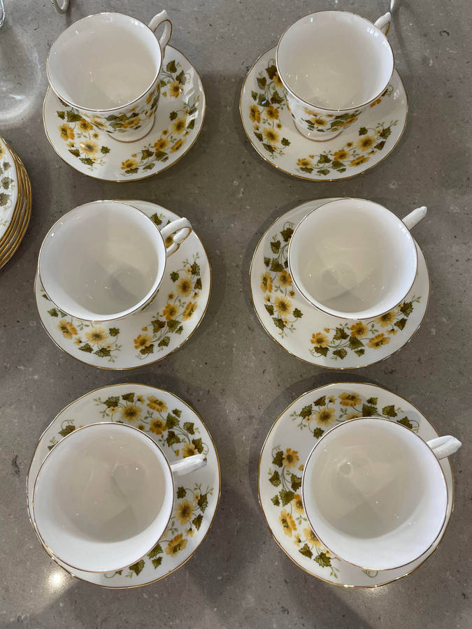 Queen Anne Bone China Footed Cup and Saucer set of 6 & 6 cake plates.  Nr - 8643 Yellow Fowers!!!!