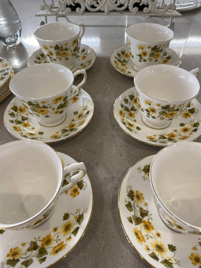 Queen Anne Bone China Footed Cup and Saucer set of 6 & 6 cake plates.  Nr - 8643 Yellow Fowers!!!!
