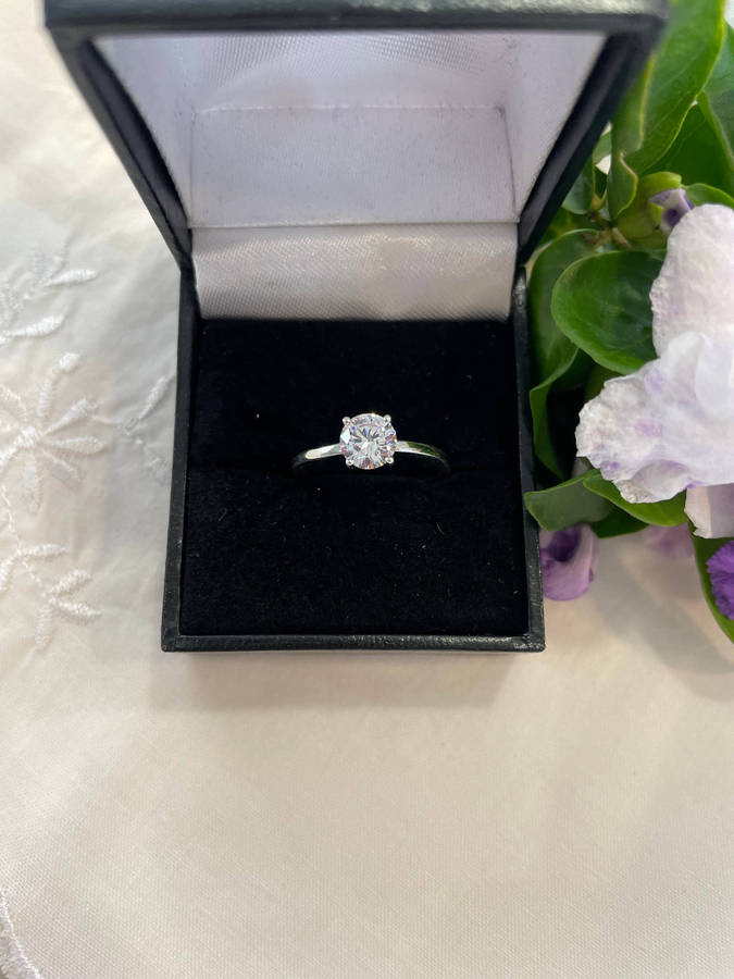 Sterling Silver "925" stamped, solid solitaire ring with CZ!