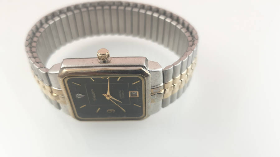 SHARP DIAMOND QUARTZ WATCH