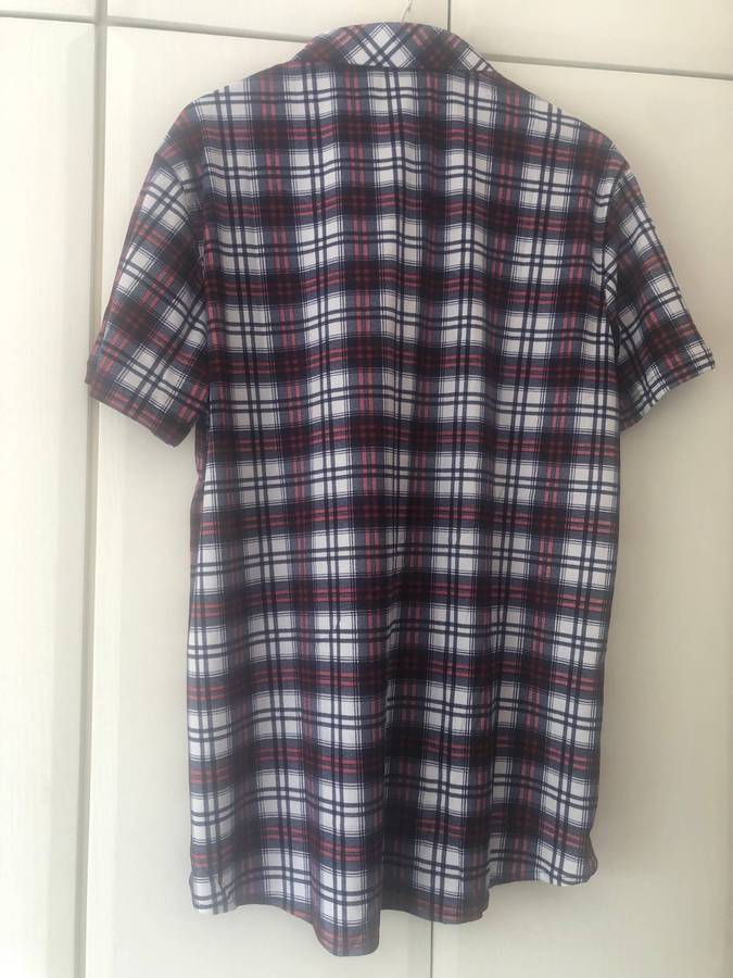 Two plaid short sleeve men shirts.