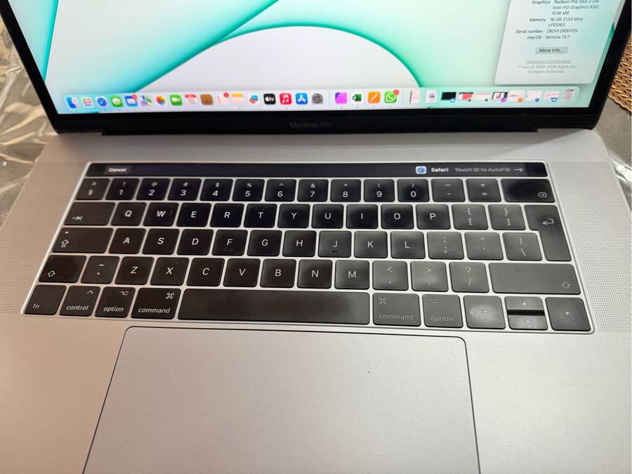 MacBook Pro 15 Inch 2017 Model with Touch Bar in immaculate condition