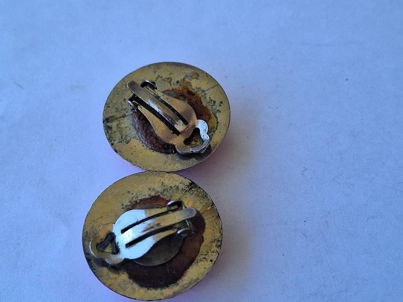 Large pink clip on earrings