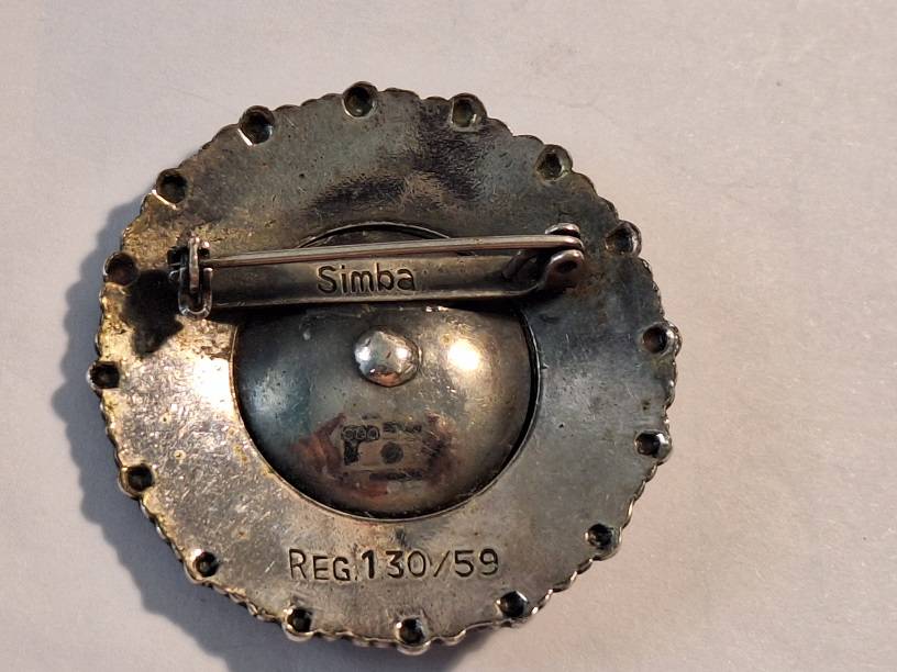 Sought after designer Simbe brooch