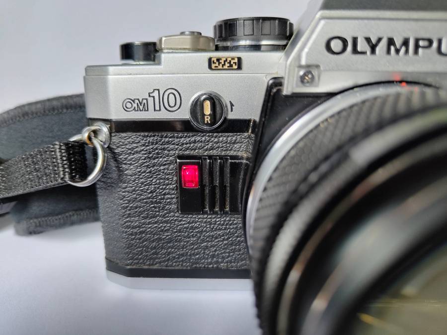 Olympus OM10 and Olympus T32 Flash with accessories
