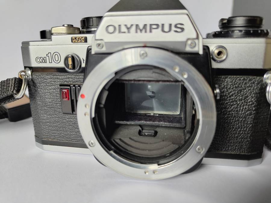 Olympus OM10 and Olympus T32 Flash with accessories