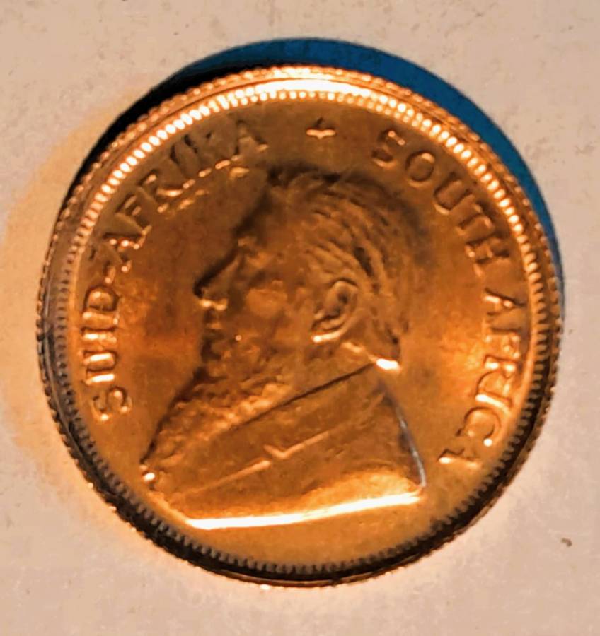 1997 ONE TENTH OUNCE GOLD KRUGERRAND, IN RED SAM BOX with SLEEVE.