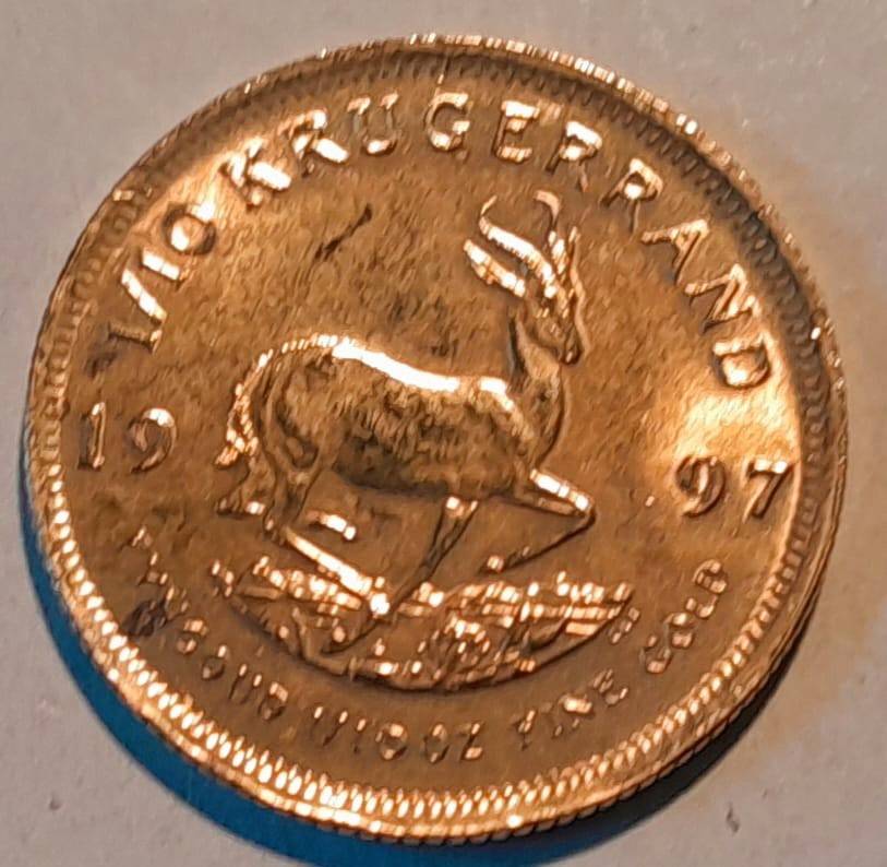 1997 ONE TENTH OUNCE GOLD KRUGERRAND, IN RED SAM BOX with SLEEVE.