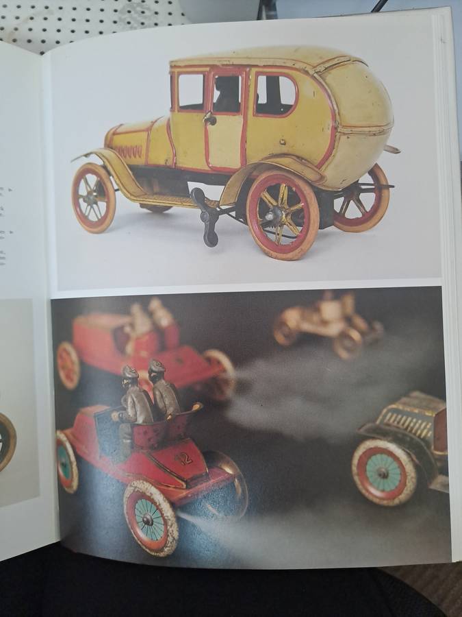 WORLD OF ANTIQUE TOYS CARRIAGES, CARS AND CYCLES.  By J & F Remise