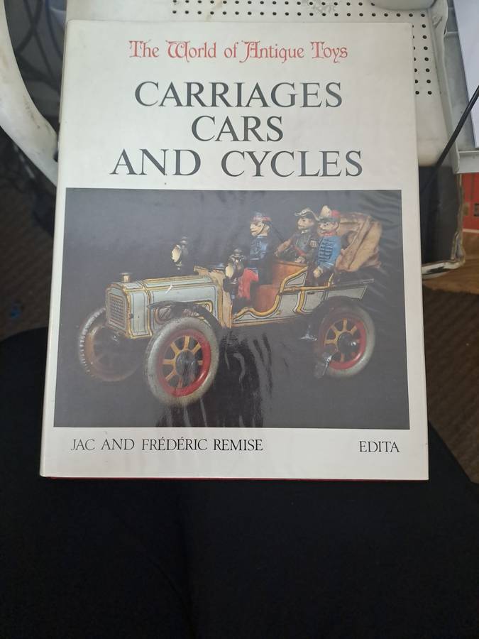 WORLD OF ANTIQUE TOYS CARRIAGES, CARS AND CYCLES.  By J & F Remise