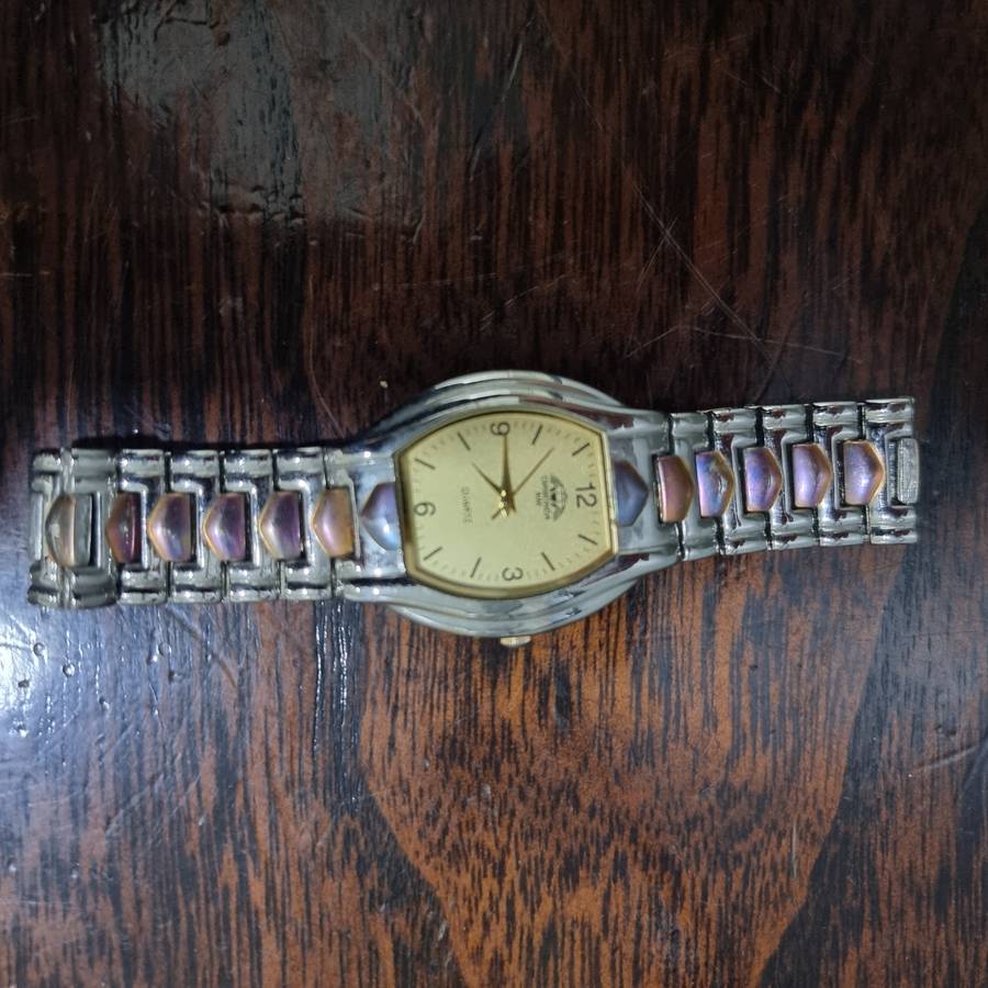 Diamonda Aim Watch with Quarts movement.