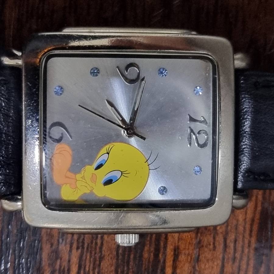 Vintage Tweety Bird watch with silver face.