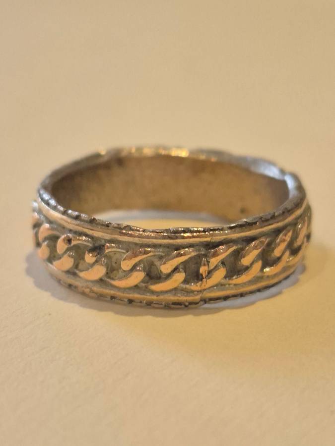 Hand finished chain design smooth irregular edge man ring. Comfort fit.