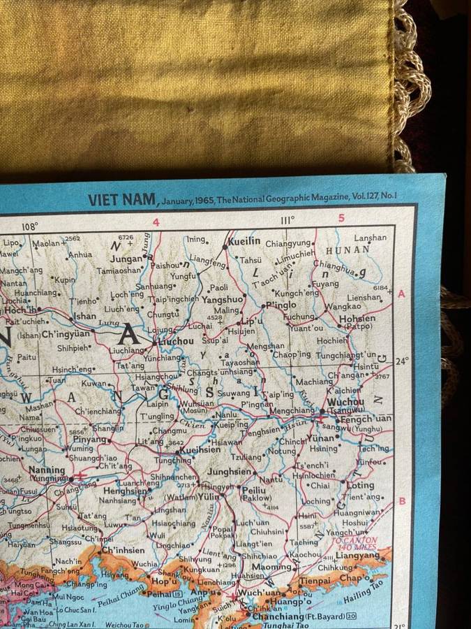 A BANNER WITH A WOVEN PATCH FOR THE VIETENAM WAR ARVN(ARMY OF THE REP. OF VIETNAM)AIR FORCE SURVEILL