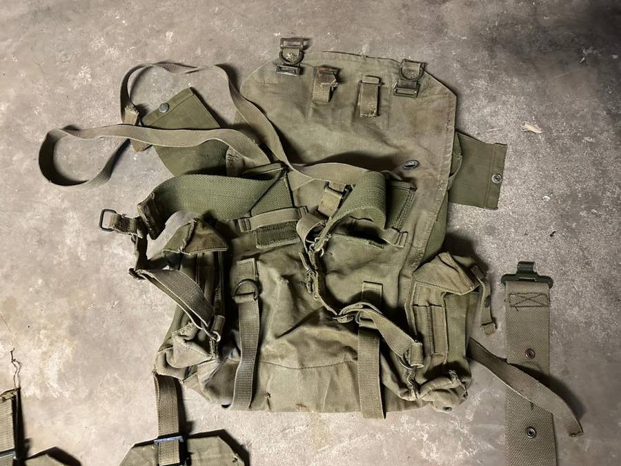SADF Pattern 73 webbing. Kidney pouches with belt and small patroll back pack. Sold with extra webbi