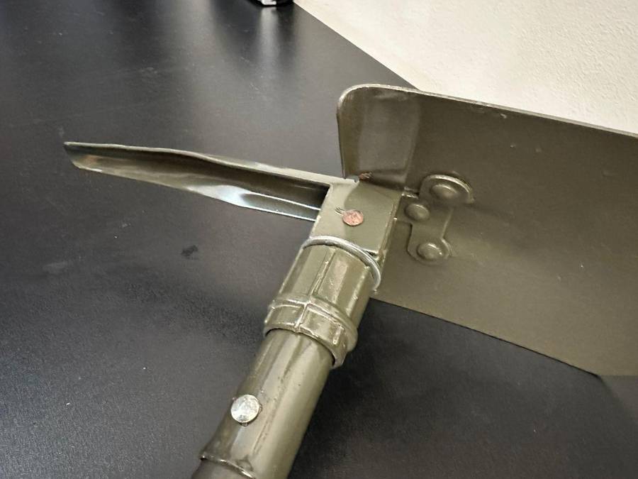 Portable, foldable spade with pick on the one side,length folded 47cm. Condition unused