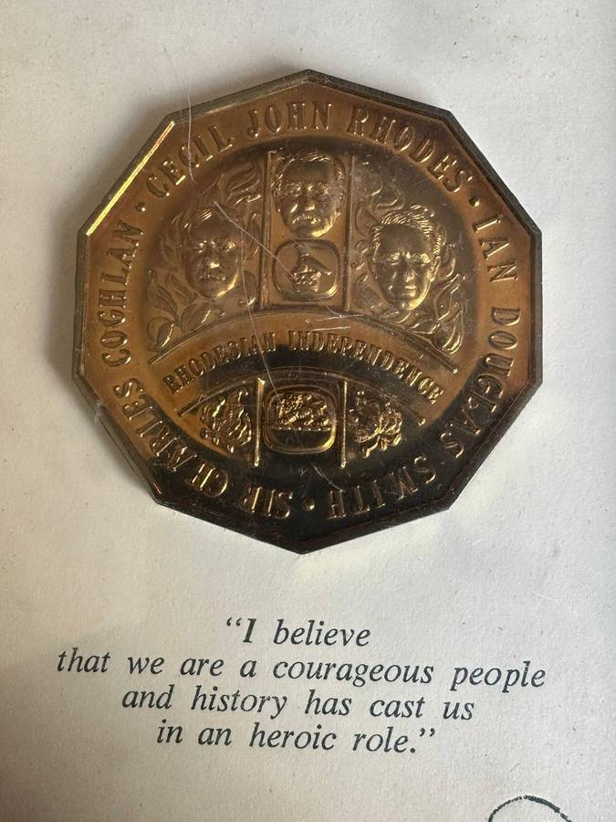 Boxed bronze Rhodesian Independence medallion.