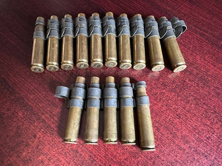 12,7 M4 machine gun belts. 2 Pieces with spent cartridges.