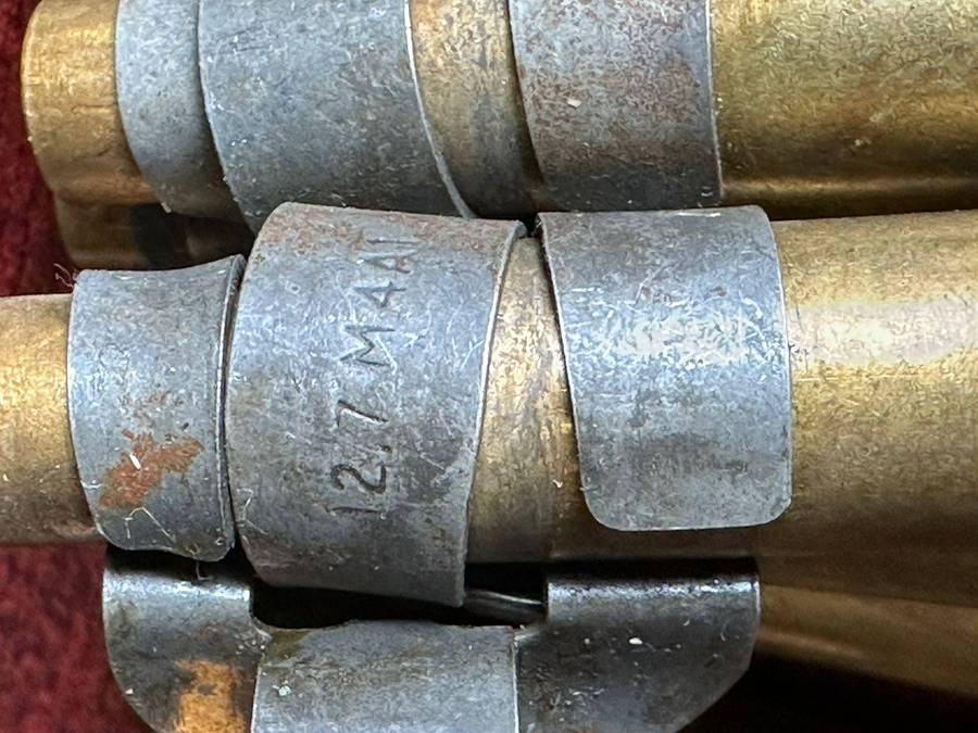 12,7 M4 machine gun belts. 3 Pieces with spent cartridges.