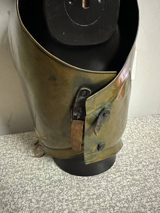 Reproduction Roman helmet and armour fitted onto a mannequin with a light inside the helmet. Sold as