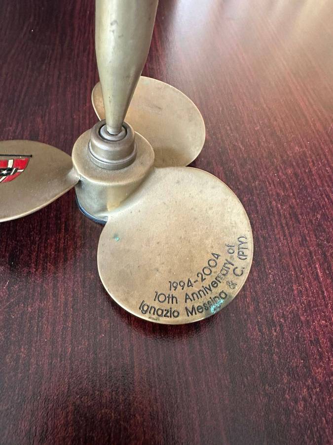 Brass propeller made into a pen holder. Diameter at the bottom 11,5cm, height 13 cm.