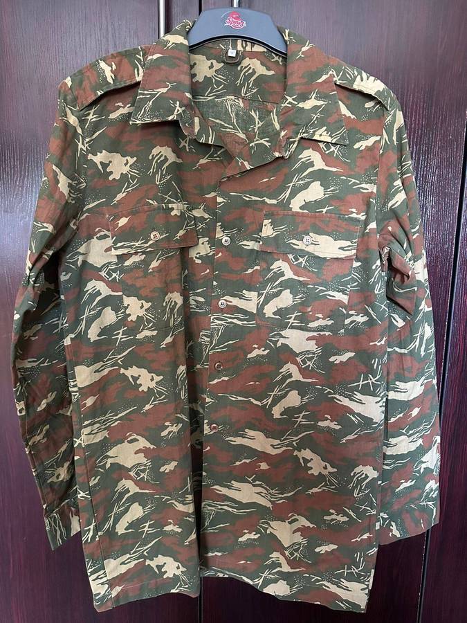 Koevoet long sleeve shirt, size large. Measures 58 cm armpit to armpit. Good condition with no damag