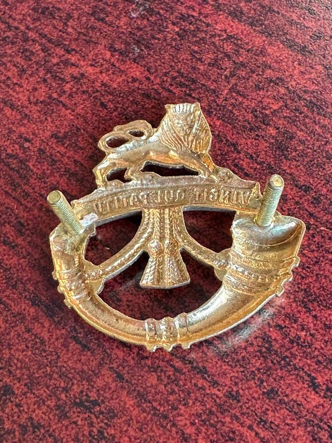 Rand Light Infantry gilding metal cap badge. This badge was struck, but never worn. 2 Lugs