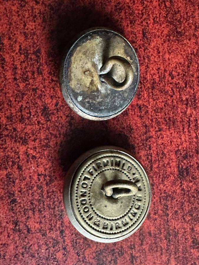 King Williams Town borough police buttons. Worn pre 1902(Queens Crown)white metal. Diameter 25 mm.