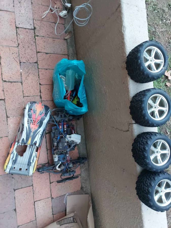Radio Control car and 4 tyres for spares, and other accessories