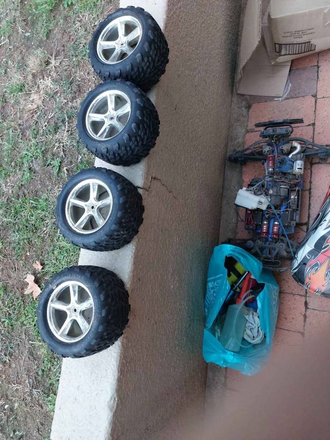 Radio Control car and 4 tyres for spares, and other accessories