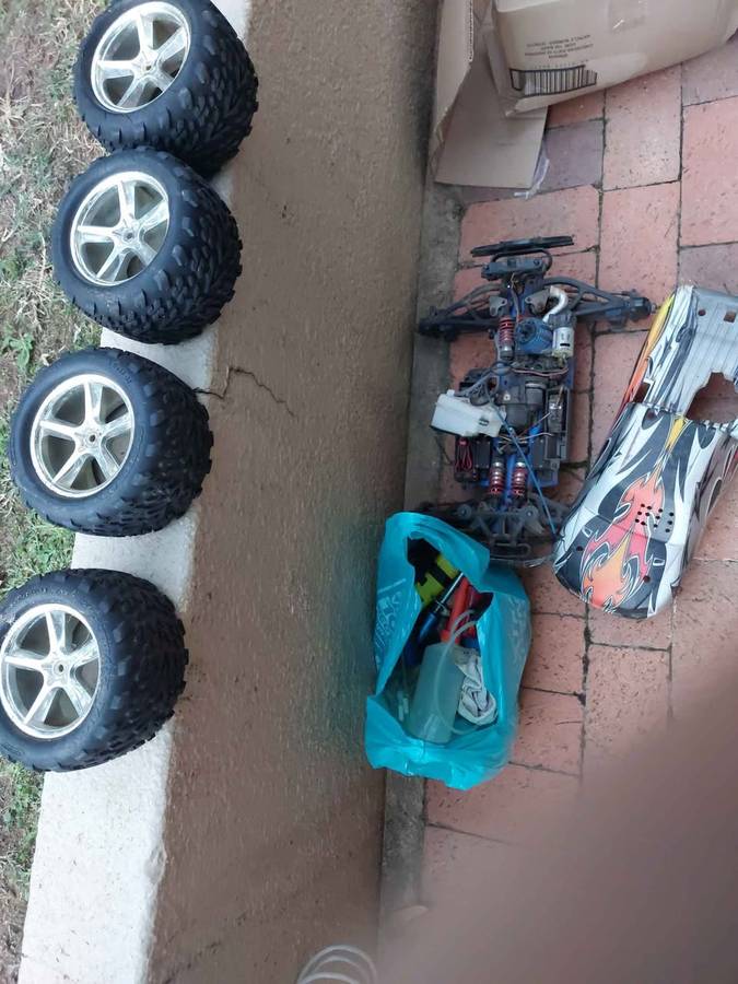 Radio Control car and 4 tyres for spares, and other accessories