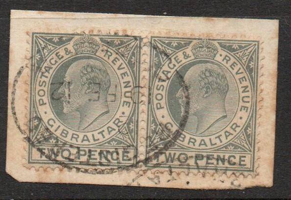 Gibraltar, EVIIR, 1910, 2d greyish-slate, pair used on fragment, REGISTERED 9 FE 12 oval d.s.