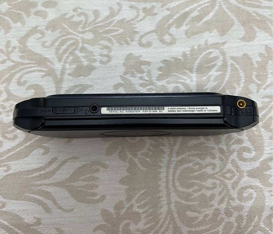 PSP Street E1004 (Black) + 4 Games