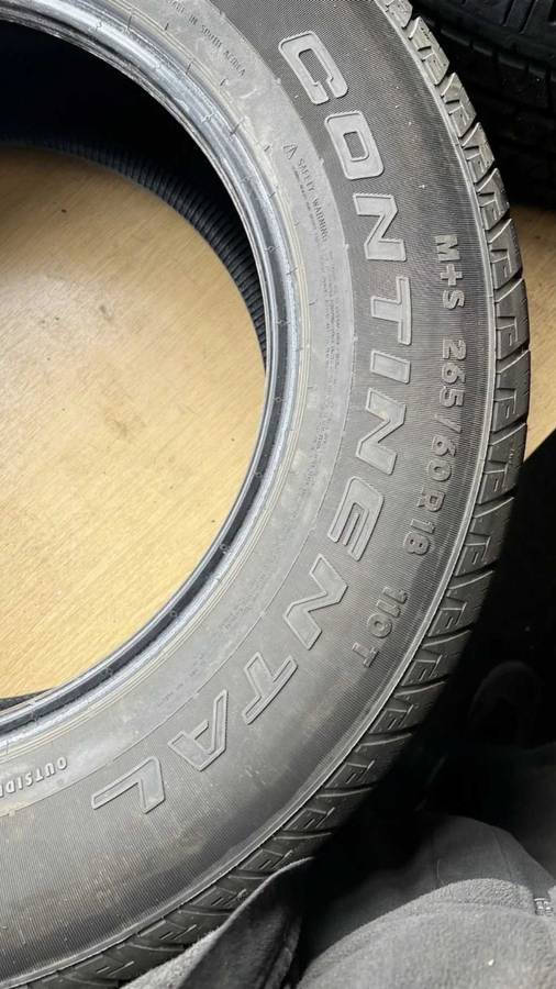 265/60/18 x 4 Dunlop Grandtrak AT. 70% thread life
