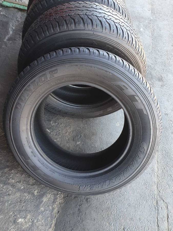 265/60/18 x 4 Dunlop Grandtrak AT. 70% thread life