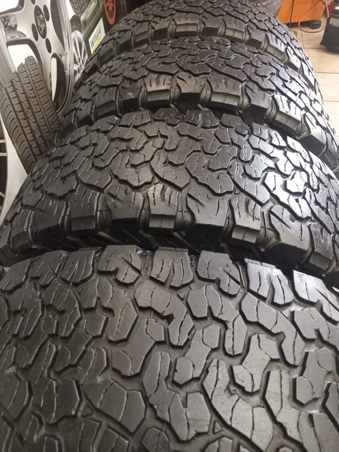 4 x 265/65/17 BF Goodrich AT Tyres.