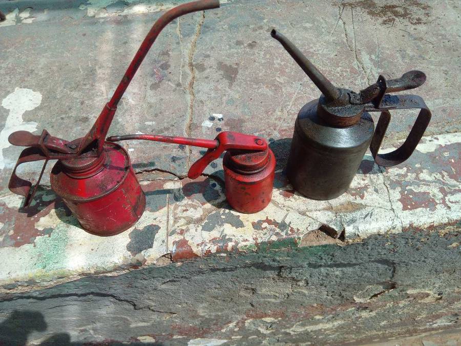 Vintage spout oil cans