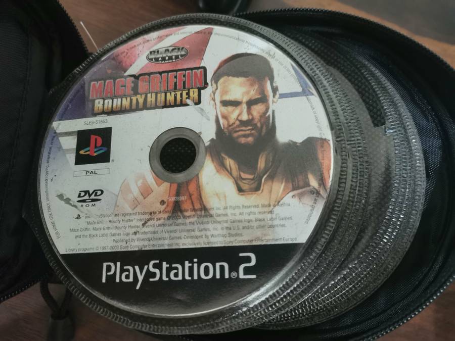 PlayStation 2 Fat Console with Remote and x7 Games