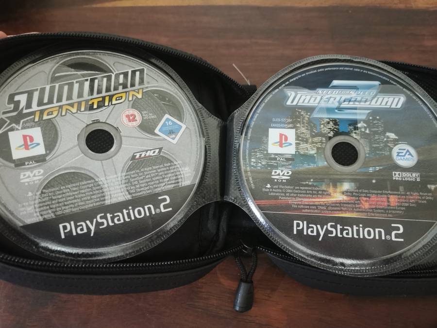 PlayStation 2 Fat Console with Remote and x7 Games