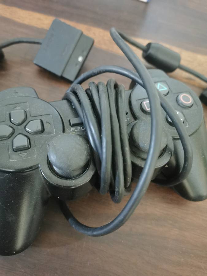 PlayStation 2 Console with Memory Card, Controllers and 7 Games