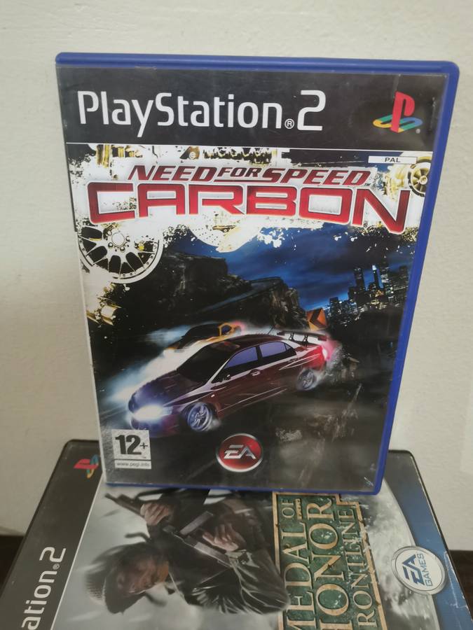 PlayStation 2 Console with Memory Card, Controllers and 7 Games