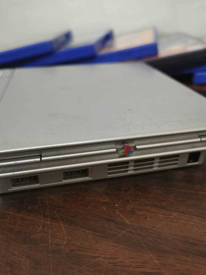 Silver PlayStation 2 Console Complete with x7 Free Games
