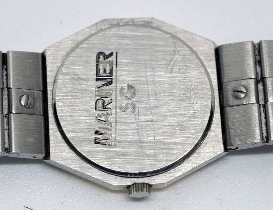 concord mariner ladies watch with solid 18K gold bezel and 18k nugget on buckle