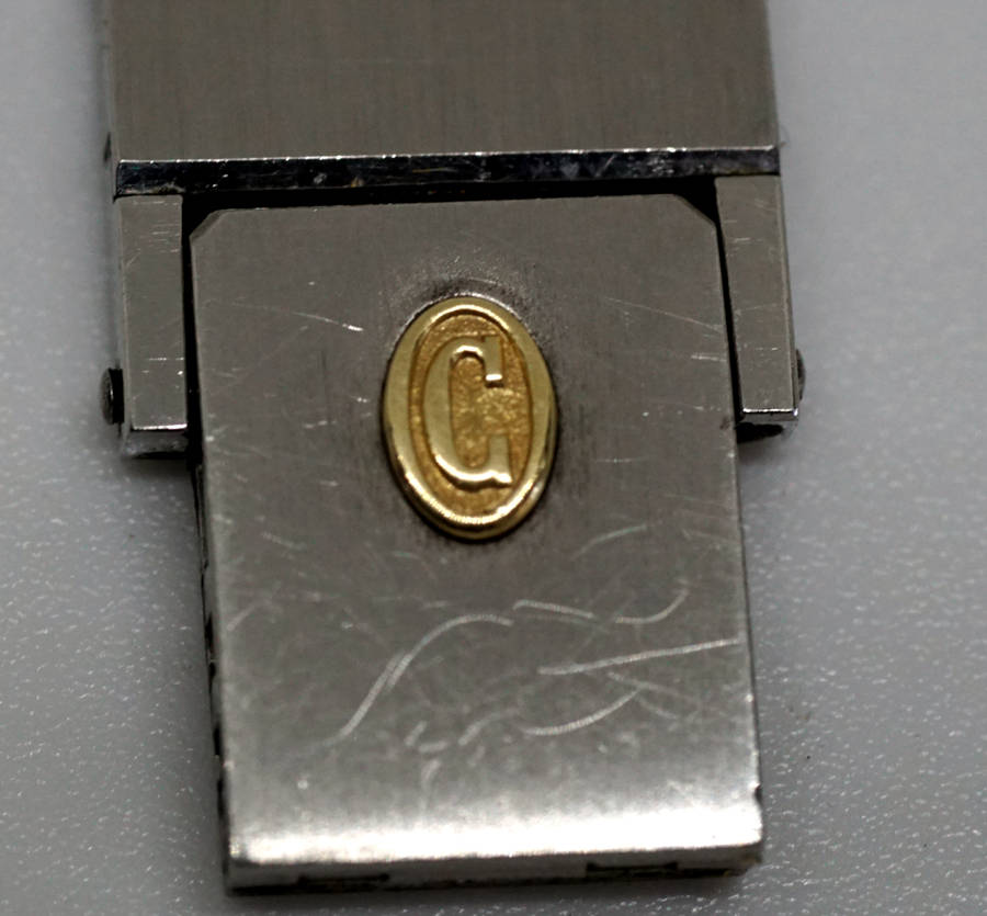 concord mariner ladies watch with solid 18K gold bezel and 18k nugget on buckle