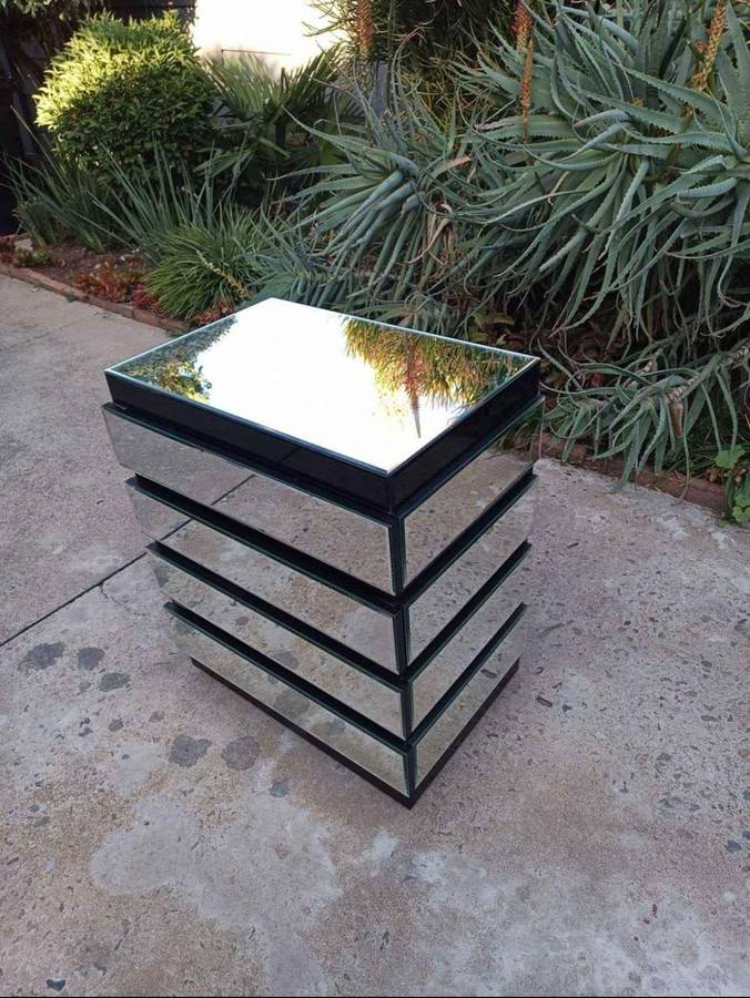 Side table with a glass finish