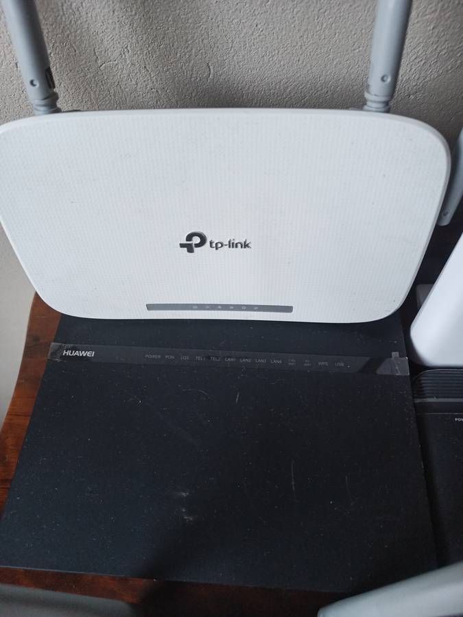 Lot of various Routers and power cables