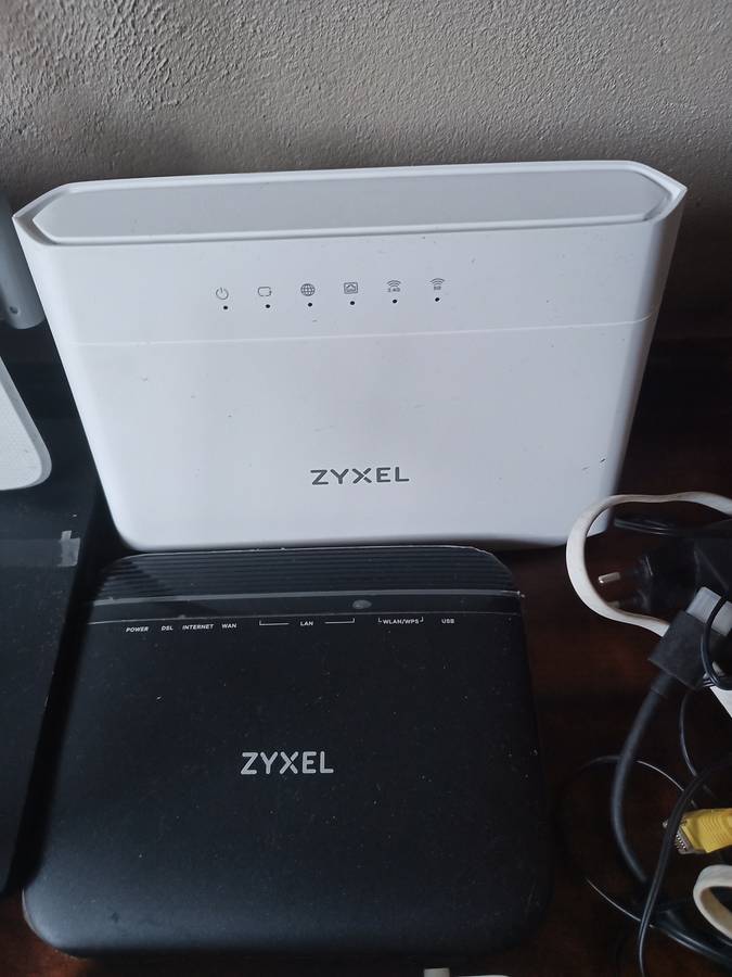 Lot of various Routers and power cables