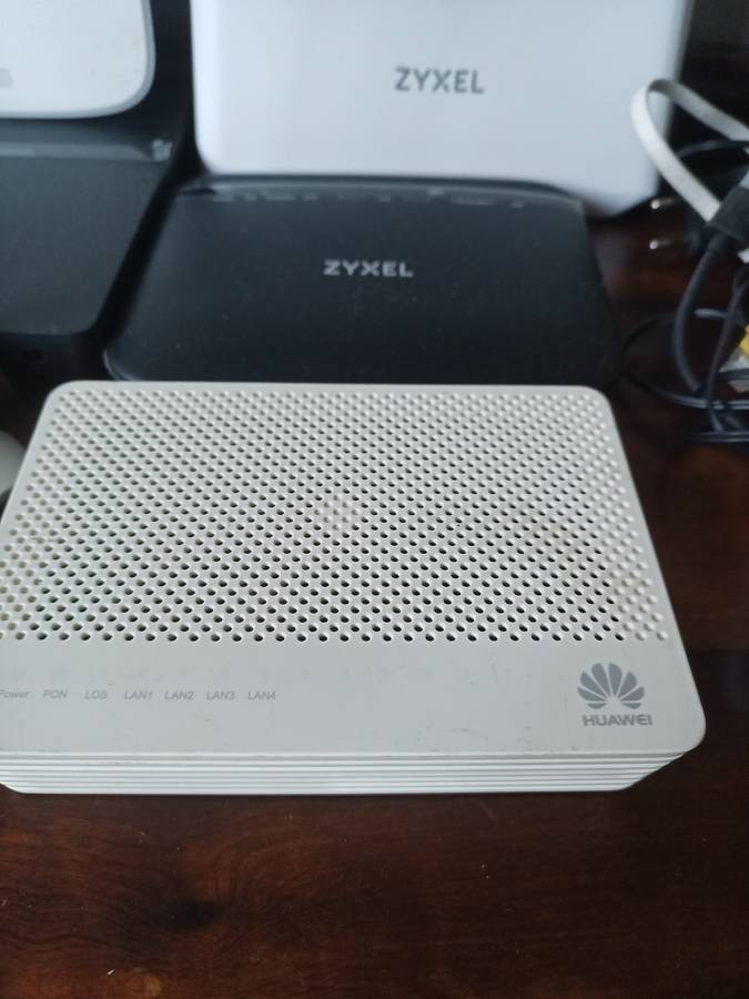 Lot of various Routers and power cables